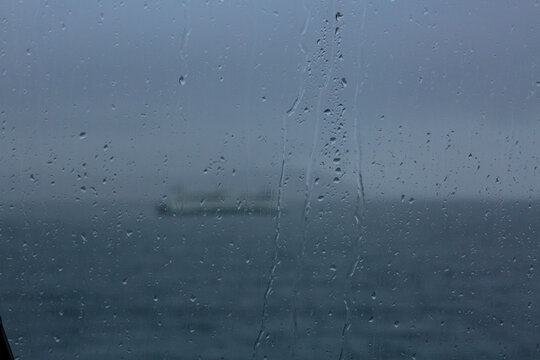 Fototapeta Puget Sound ferry seen through a wet window