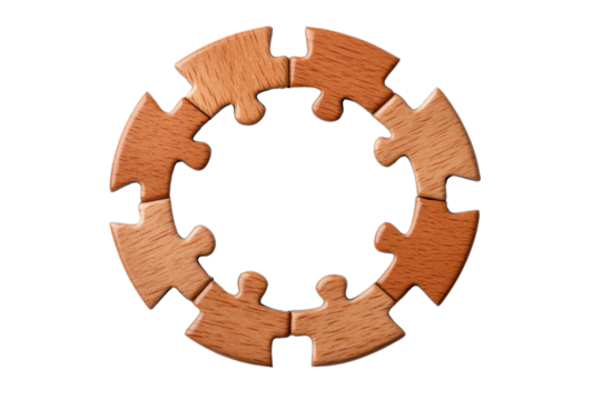 Wooden puzzle pieces arranged in a circular pattern on a white isolate background.
