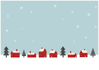 雪の降るクリスマスの街並み