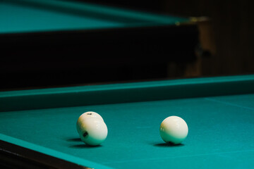 Sports game of billiards on a green cloth