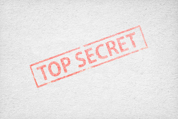 Top secret stamp on the white gray paper background