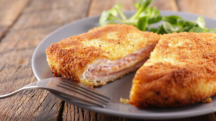 Cordon bleu on plate with lettuce