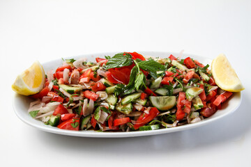 Turkish kebab salad mixed salad plate. onion, tomato, pepper, parsley and spices