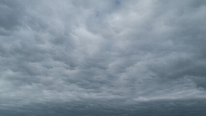 Cirrocumulus cloud in evening. Beautiful and relaxing clouds with a dark blue afternoon sky....