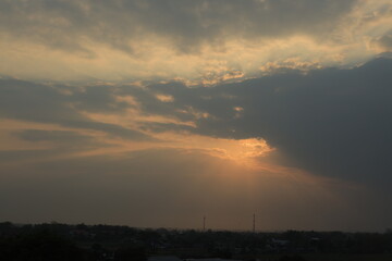 Tranquil Sunset with Dramatic Sky and Colorful Clouds.