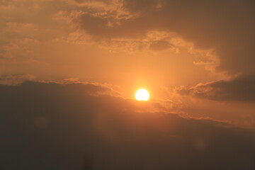 Tranquil Sunset with Dramatic Sky and Colorful Clouds.