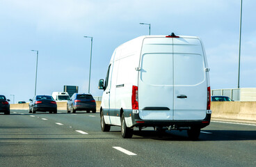 A White Van Travelling Along A Motorway Currently Sitting In The Fast Lane © ANDREW NORRIS