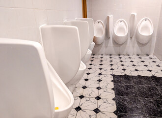 A View Of The Typical Male Urinals In Public Or Venue Toilets