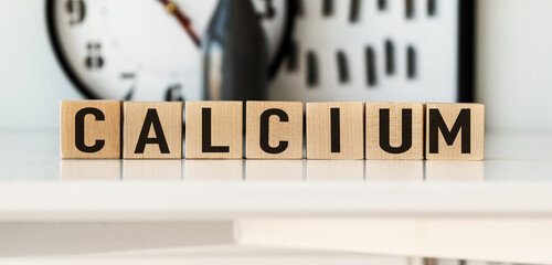 A wooden block with the word Calcium written on it