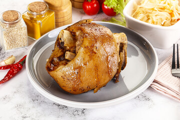 Baked pork knee with spices
