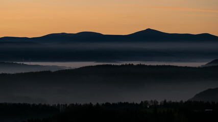 Sunset in the Teplice-Adršpašské rocks. View of the Krkonoše Mountains from the Teplice-Adršpašské rocks.