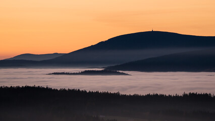 Sunset in the Teplice-Adršpašské rocks. View of the Krkonoše Mountains from the...