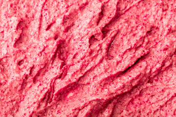 Obraz premium Fruit pink ice cream. Yogurt smoothie with fresh fruits and berries. Ice cream texture. Delicious sweet dessert close-up as background.