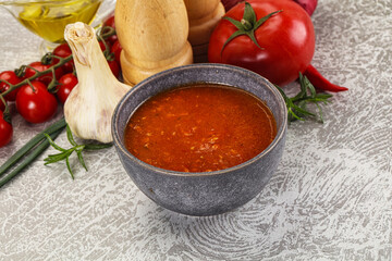 Hot tomato soup with diced chicken