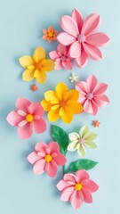 Paper flowers in shades of pink, yellow, and green are arranged on a light blue background