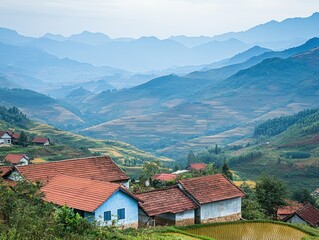Obraz premium Scenic view of terraced fields and mountains under a cloudy sky.
