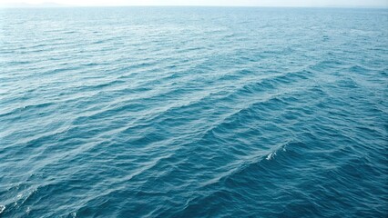 Fototapeta premium Oceanic texture with wavy ripples on a soft blue background, stylized waves, subtle gradient, rippled surface, aqua background