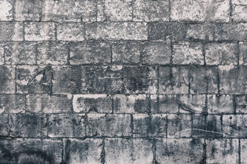 Grey stone wall close up