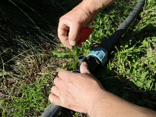 using plumbing thread to seal the threads of a connection in a garden plumbing structure