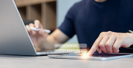 close up man hand type on digital tablet device to access account on website by input username and...