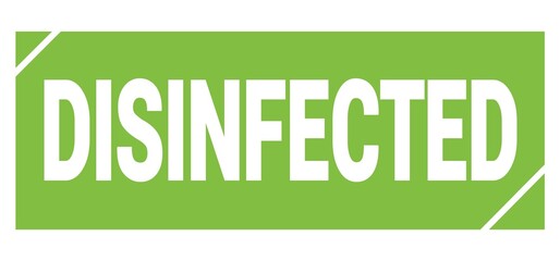 DISINFECTED text written on green stamp sign.