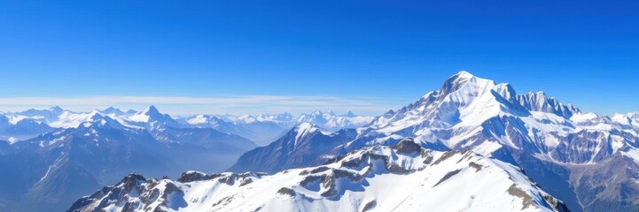 Panoramic view of Mont Blanc mountain range with snow-covered peaks and blue sky, Mont Blanc, hiking