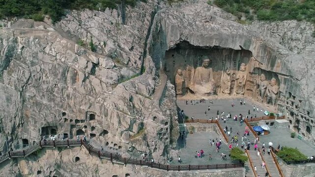 Aerial drone view of Longmen Grottoes Caves Yi River Luoyang in Henan province, China. Chinese Buddhist art Longmen Caves. Longmen Grottoes Caves in Luoyang, China.