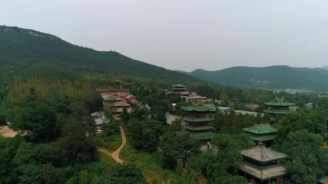 Aerial drone view of  Shaolin temple in Henan Province, China, Asia. Pagoda Forest at Shaolin Temple in China Asia. Shaolin Monastery from drone. 