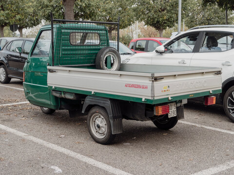 Green Ape piaggio cargo van scooter parking in a parking lot
