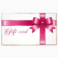 Gift card with pink and gold bow. Gift card in pink and gold colours on beige background.