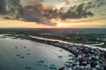 sunset over beach village