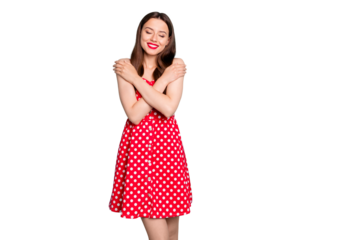 Portrait of cute lady with her eye closed smiling wearing polka dot skirt dress isolated over teal turquoise background
