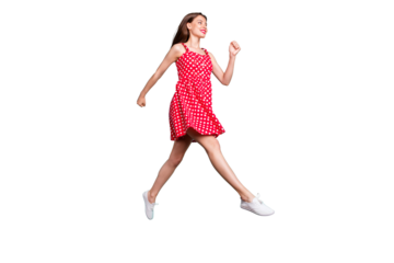 Full size photo of cute lady running wearing dotted skirt dress isolated over green teal turquoise background