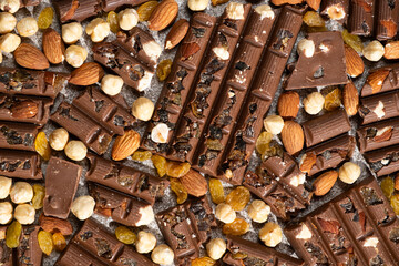 Close-up of milk nut chocolate. Healthy sweets, lactose-free and sugar-free chocolate