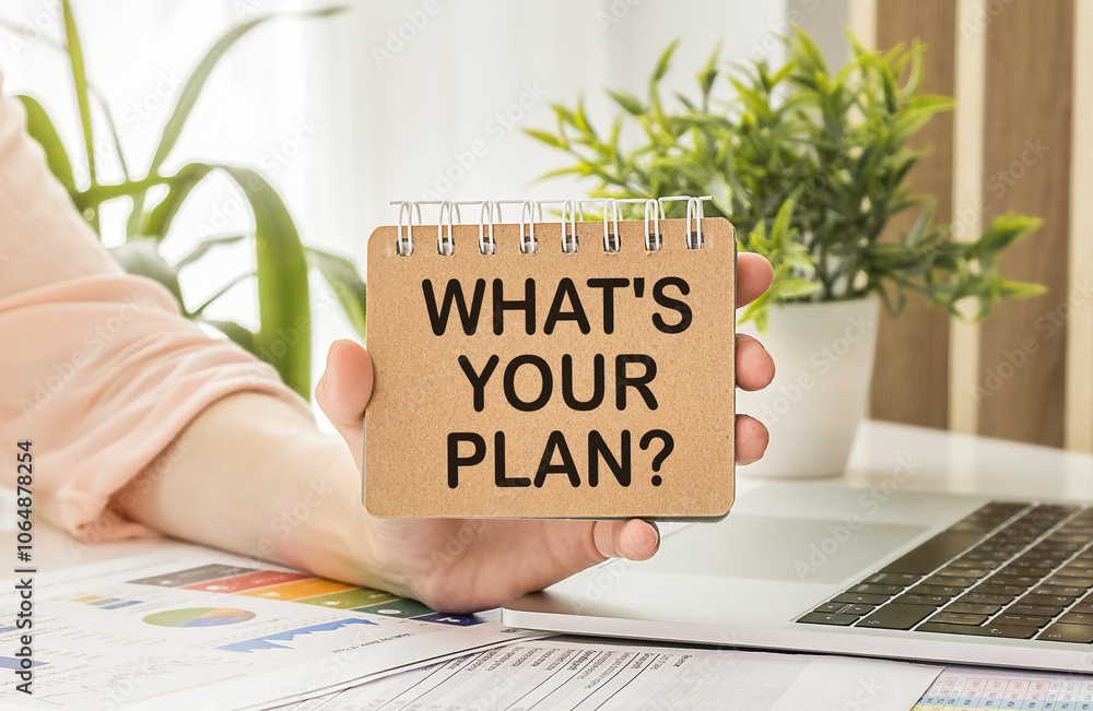 Poster top view of desk calendar and notebook with text what's your plan