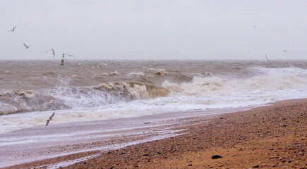 A Storm Approaches The Coast Creating High Waves And Rough Seas