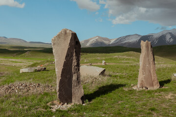Ancient standing stones in the Armenian landscape during a clear day in spring
