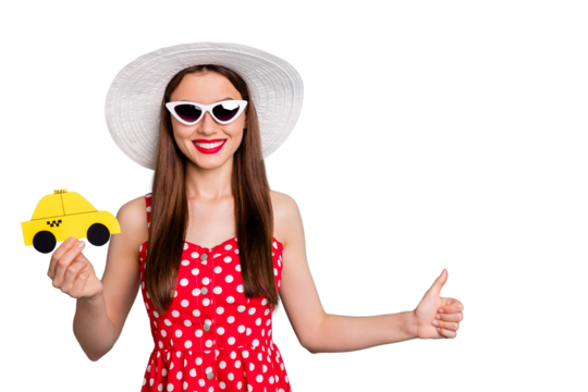 Close-up portrait of her she nice attractive cheerful straight-haired girl holding in hand yellow vintage car card ask stop life style isolated over green blue turquoise bright vivid shine background