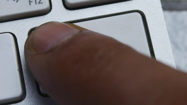 Delete Key on White Desktop Keyboard Pressed by Finger Hand Multiple Times - Close Up Macro Shot