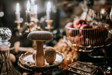 A luxurious, candlelit scene featuring golden mushrooms, a crystal decanter, and a bowl of peaches, creating an opulent and vintage atmosphere..
