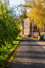 Obraz premium Bogorodsk, Nizhny Novgorod region, Russia, Street view of an ancient provincial Russian city on the shore of a lake on a summer evening. An ancient building of artisans, an architectural monument.