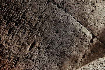 Ancient stone carvings at Khor Virap Monastery in Armenia feature historical inscriptions