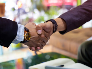 Businessteam of deal which handshake man and Success concept of handshaking after successful deal job