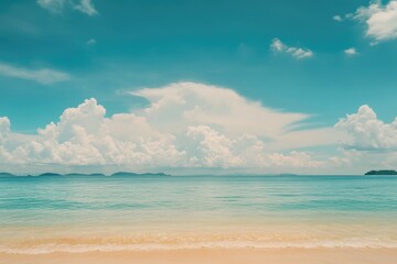 Obraz premium A scenic view of the ocean from a sandy beach, perfect for travel or outdoor lifestyle images