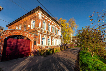 Bogorodsk, Nizhny Novgorod region, Russia, Street view of an ancient provincial Russian city on the shore of a lake on a summer evening. An ancient building of artisans, an architectural monument.