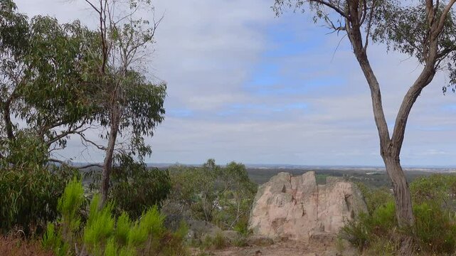 The Viewing Rock Lookout is a rocky outcrop atop a mountain ridge offering spectacular views over Heathcote, Victoria, Australia.