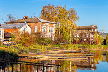 Bogorodsk, Nizhny Novgorod region, Russia, Street view of an ancient provincial Russian city on the shore of a lake on a summer evening. An ancient building of artisans, an architectural monument.