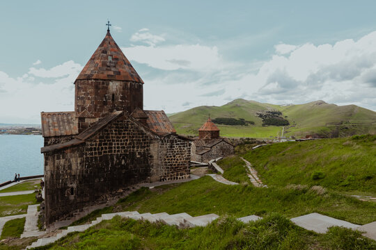 Explore the historic Sevanavank Monastery overlooking Lake Sevan in Armenia on a clear day