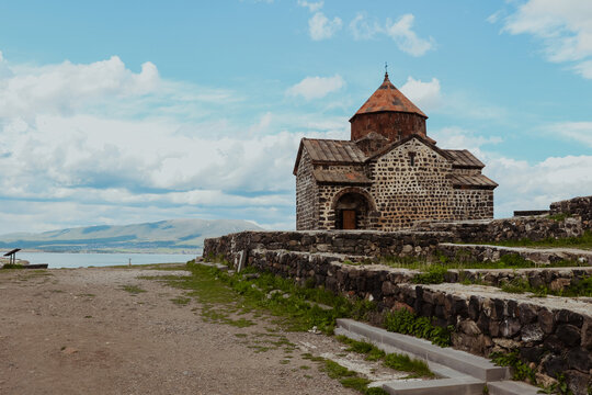 Sevanavank Monastery in Armenia surrounded by serene landscapes and distant mountains