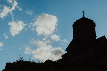 Silhouette of Tatev Monastery against the sky in Armenia during late afternoon